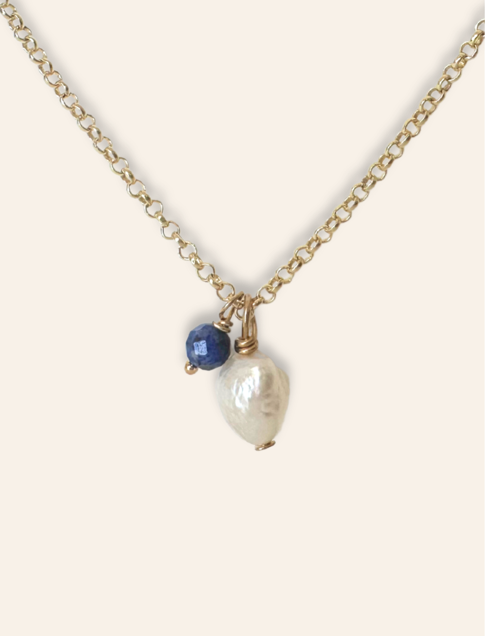 Dainty gold necklace with crystal pendant charm. Gold belcher chain necklace with lapis lazuli. Necklaces designed to stack