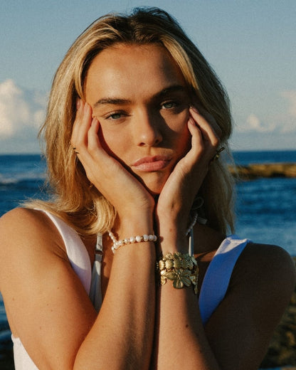 all gold bracelet stack with gold bangles - Haylo & Co.