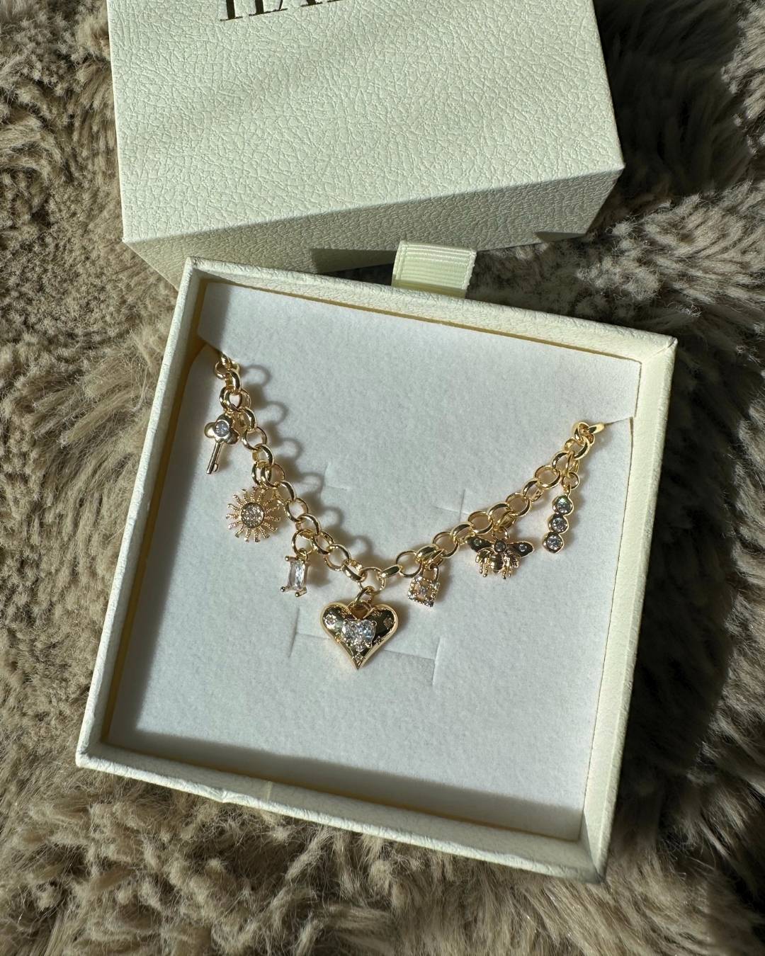 chunky gold charm necklace with diamond charms