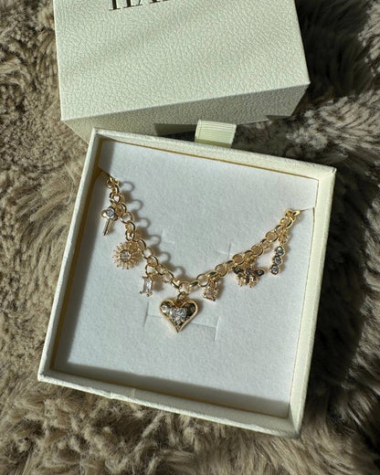 chunky gold charm necklace with diamond charms