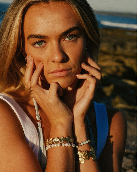 Gold flower bracelet cuffs with dainty flower bracelet cuff and chunky flower bracelet cuff - Haylo & Co.