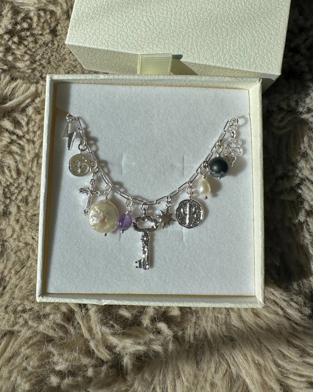 silver spiritual charm necklace with spiritual charms